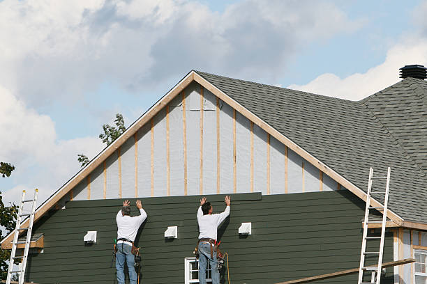 Professional Storm Damage Siding Repair technician working in Wallingford, CT
